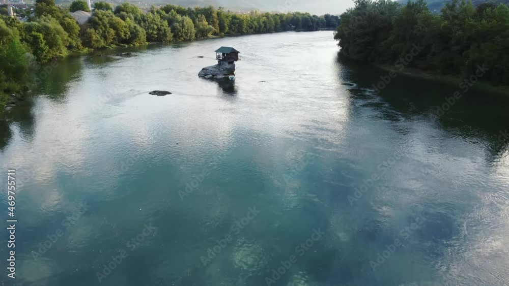 Small wooden cabin on a rock in the middle of river Drina, Serbia.
Small wooden cabin on a rock in the middle of river Drina, Serbia.