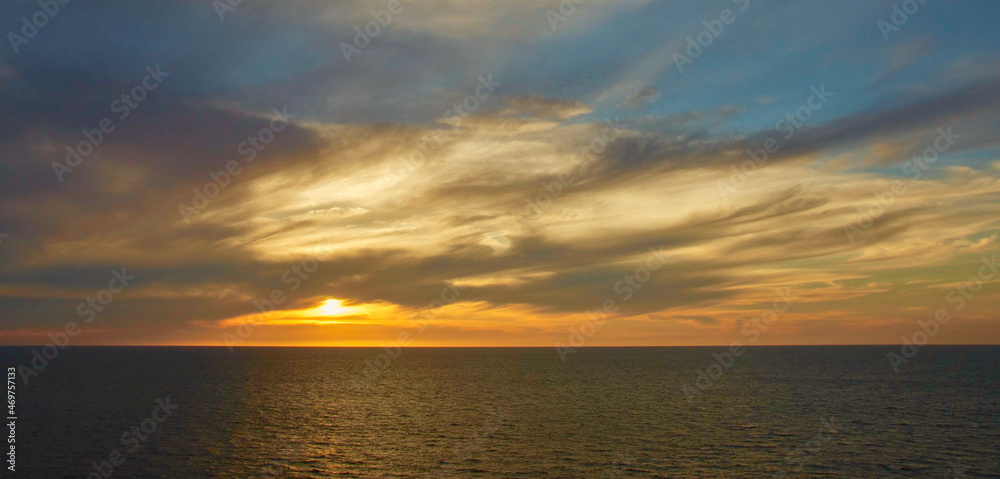 Colorful sunset on the horizon in Pacific Ocean