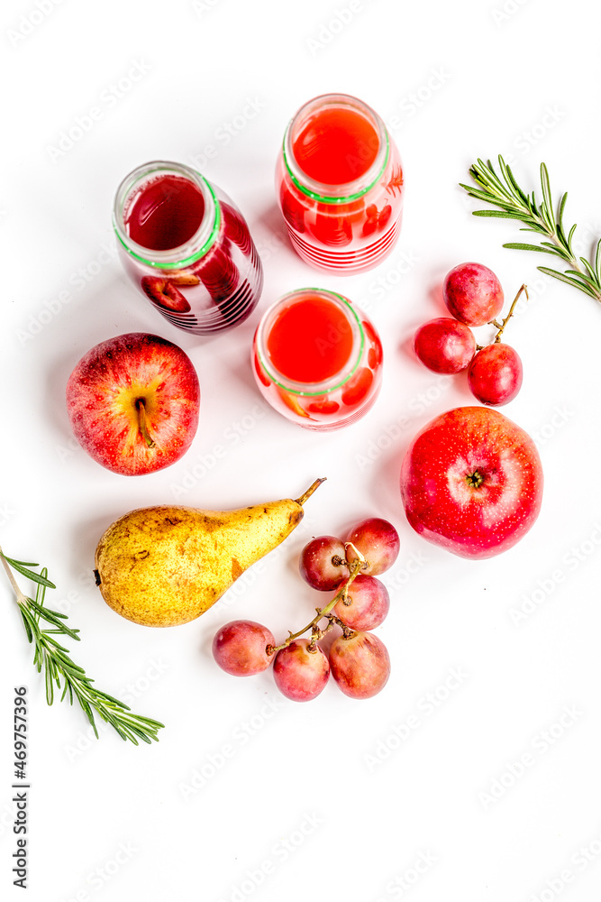 colorful plastic bottle with fruit on white background top view colorful plastic bottle with fruit on white background top view