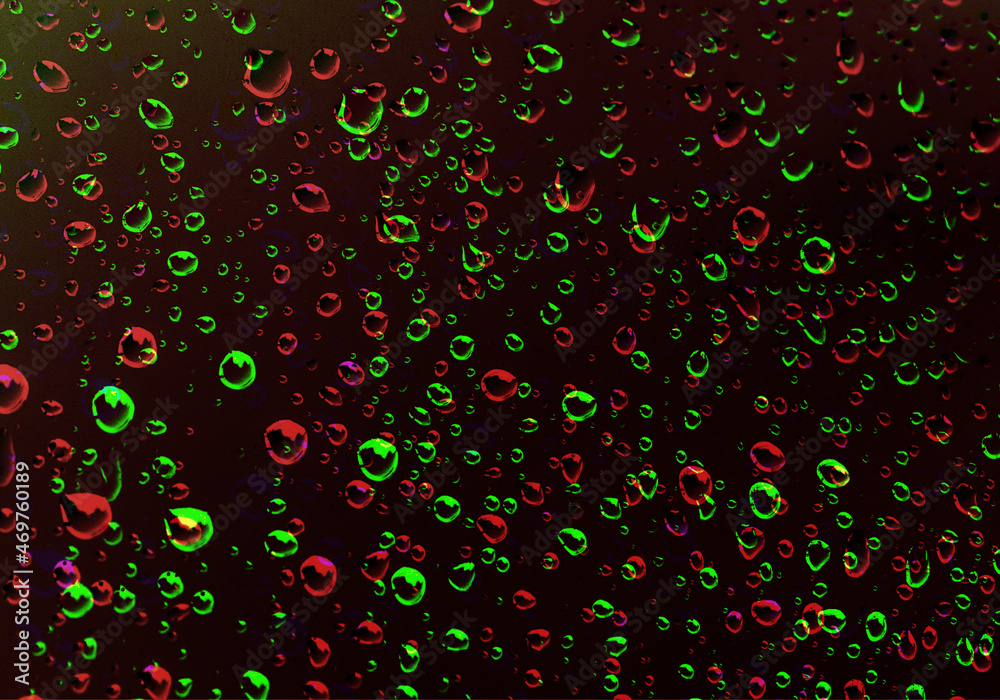 Fondo de gotas de agua verde y rojo sobre fondo negro Fondo de gotas de agua verde y rojo sobre fondo negro