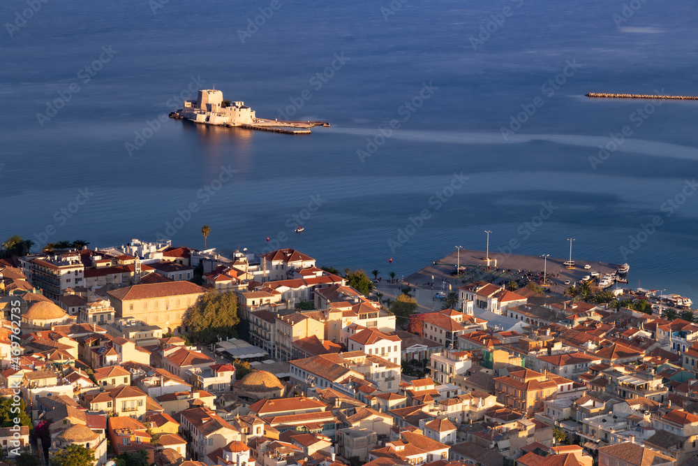 Aerial view of Mediterranean town seafront and fortress on small island Burdzion, Nafplio, Greece