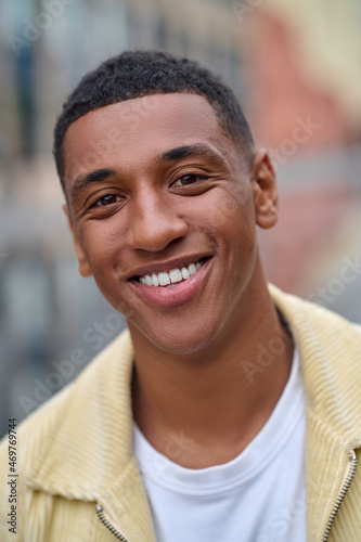 Headshot of a smiling handsome young man © zinkevych