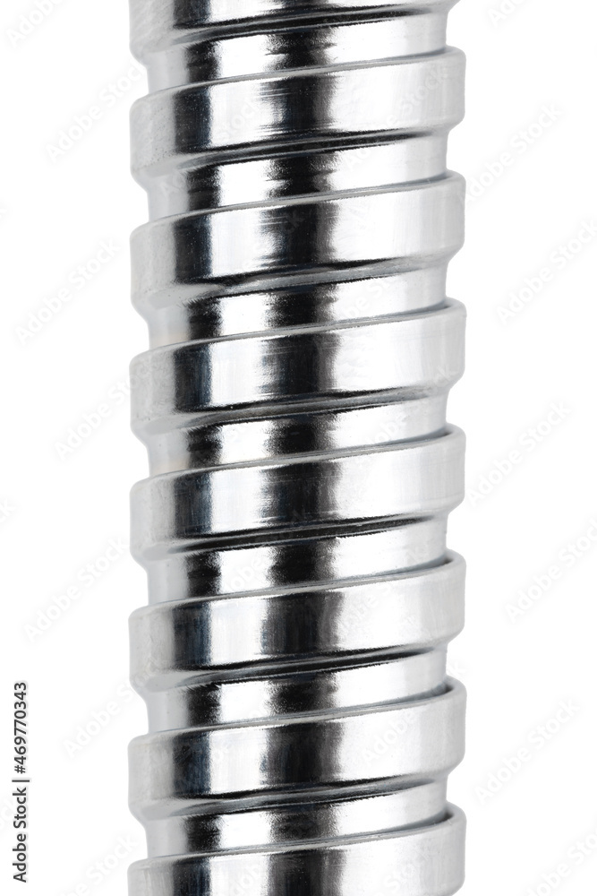 Shower hose on a white background. Silver shower hose close-up. Shower hose on a white background. Silver shower hose close-up.