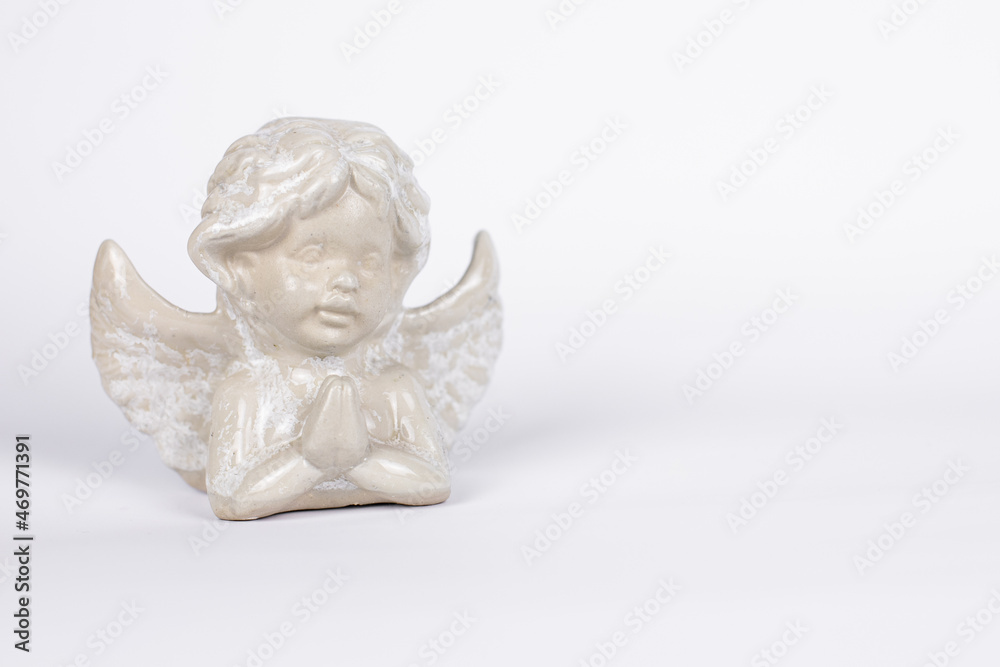 statuettes of angels on a white background statuettes of angels on a white background