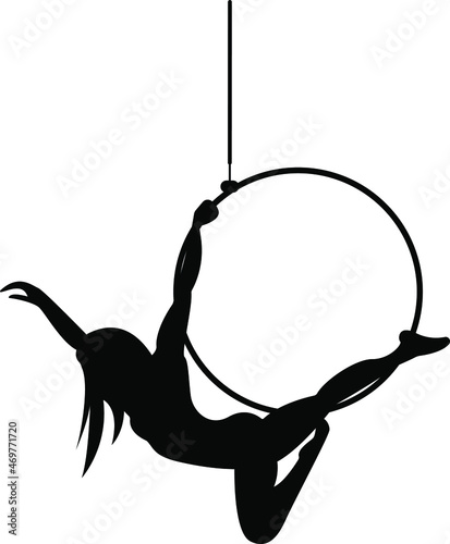 Aerial acrobat in the ring. A young girl performs the acrobatic elements in the air ring. Vector. Graceful aerial acrobat doing her performance with a hoop isolated silhouette. Beautiful woman dancer 