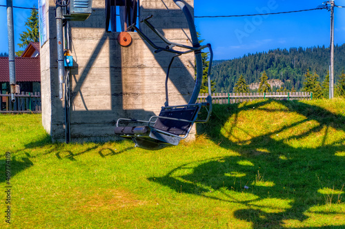 Empty ski lift chair during summer time.