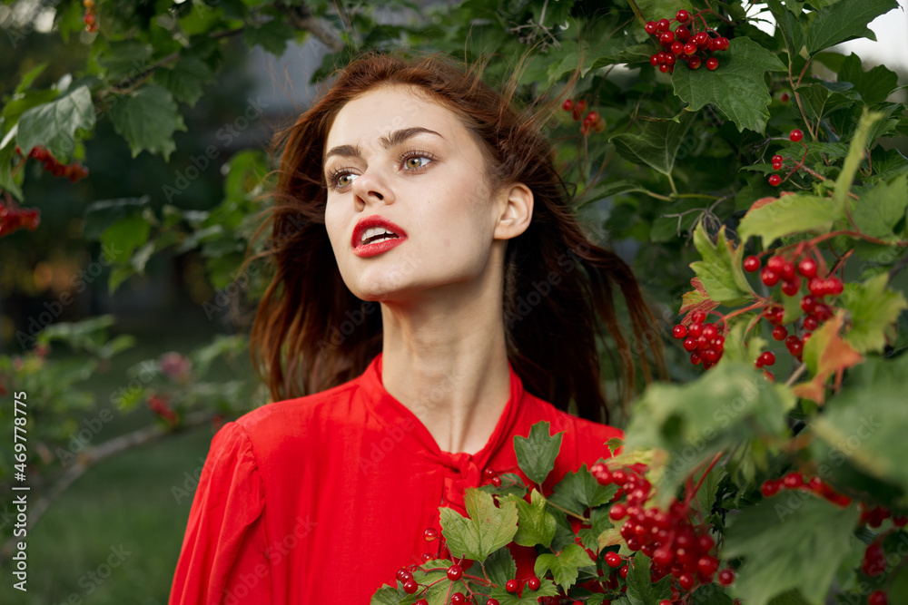 pretty woman in red shirt nature green leaves summer pretty woman in red shirt nature green leaves summer
