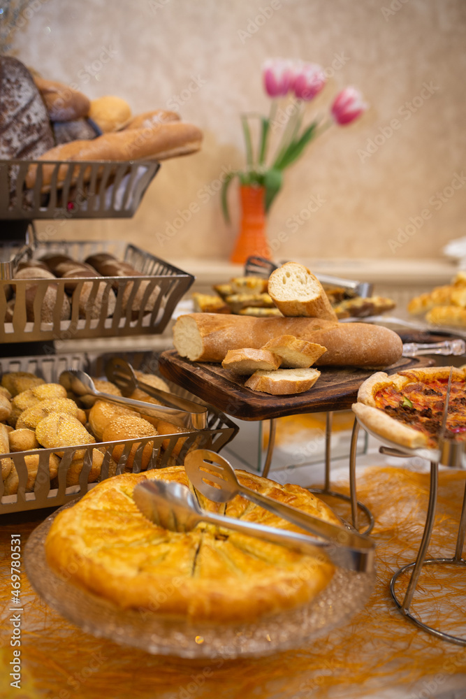 assorted bread basket on the buffet table assorted bread basket on the buffet table