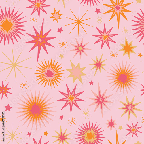 Pink and orange and gold starburst seamless vector pattern. Bright, colorful bursts and stars. Fun, festive abstract fireworks. Repeat background surface texture print. Decorative gift wrap paper art.