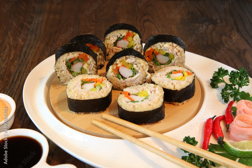 hot roll set sashimi japanese food on wooden background hot roll set sashimi japanese food on wooden background