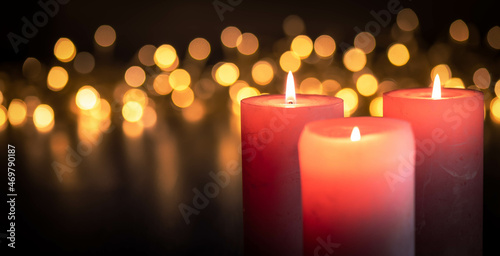 Candle with golden Lights at Christmas time