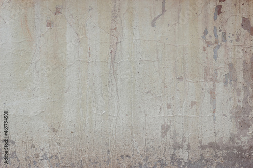 Old wall covered with cement. Beautiful wall with a lot of cracks and spots	
