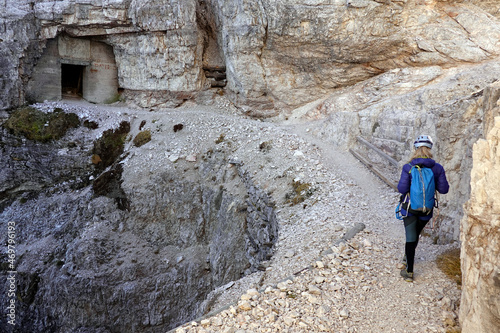 Young woman on the via ferrata Innerkofler De Luca in Sexten Dolomites, South Tyrol, Italy, Europe  photo