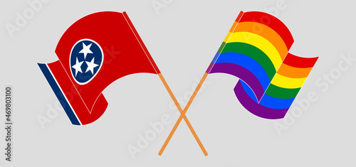 Crossed and waving flags of The State of Tennessee and LGBTQ