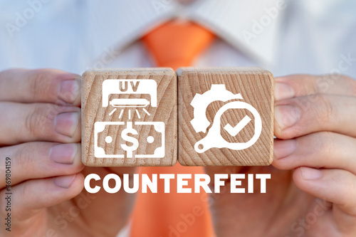 Concept of counterfeit money. Cash counterfeits crime. Financial counterfeiting stop.