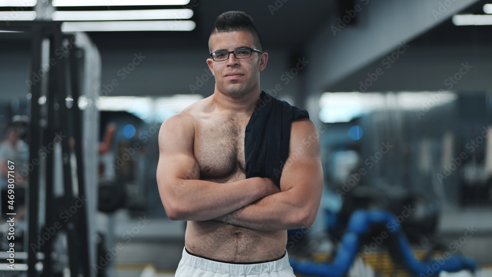 Fototapeta premium Muscular Arab in the gym after a workout.