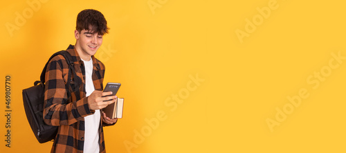 student with mobile phone isolated on background
