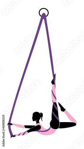 Aerial silk dancer in silhouette	