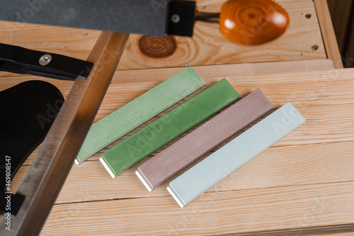 Set of professional whetstone for sharpener knife. Sharpener and whetstones. photo