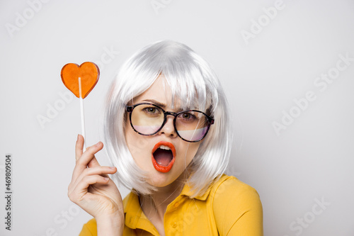Cheerful Woman in White Lollipop Wig Red Lips Posing © VICHIZH