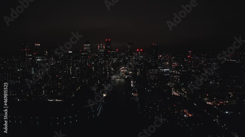 Aerial bird's eye view of famous Canary Wharf skyscraper complex, Isle of Dogs in London, United Kingdom photo