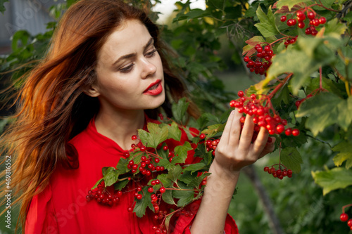 Woman in red shirt plants berries nature summer