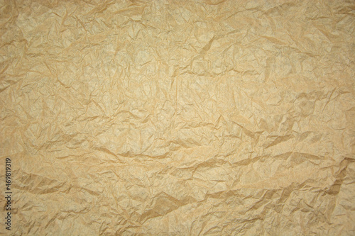 Crumpled ecological or kraft paper. Old paper surface texture.