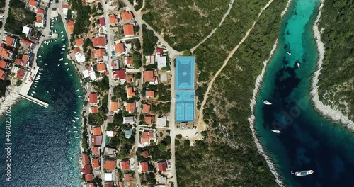 Aerial view of sporting place on hilltop between a paradise bay and Zavalatica town on Korcula Island, Dalmatia, Croatia. photo