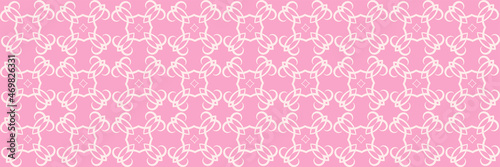 Beautiful background pattern with white decorative ornament on pink background. Wallpaper  textile design texture.