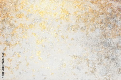 Background image of gold and silver patterns on white Japanese paper