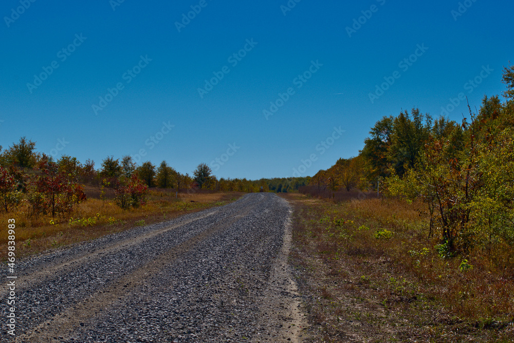 Gravel road in autumn