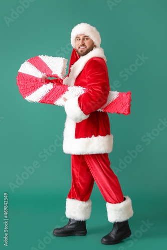 Santa Claus with candy cane...