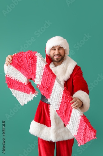 Santa Claus with candy cane...