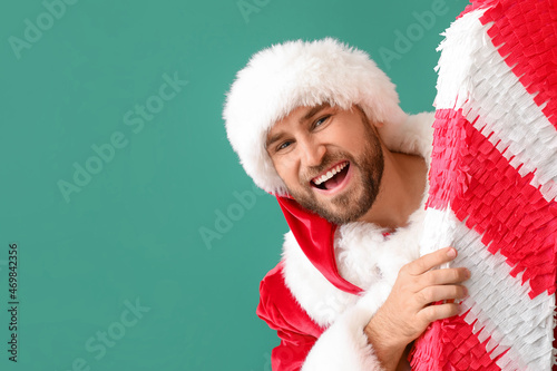 Santa Claus with candy cane...