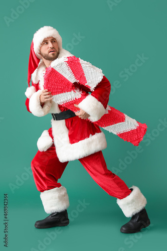 Santa Claus with candy cane...