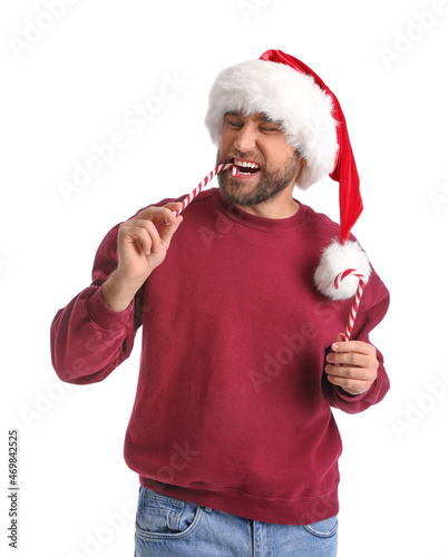Handsome man in Santa hat e...