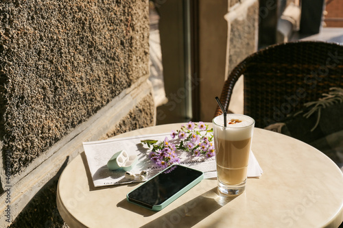 Glass of tasty coffee, flow...
