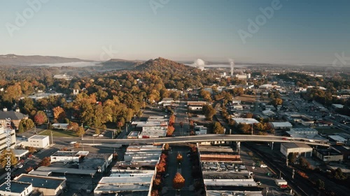 Hyperlapse drone downtown Dalton flying towards factories in the morning. photo