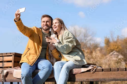 Lovely couple with cute dog...