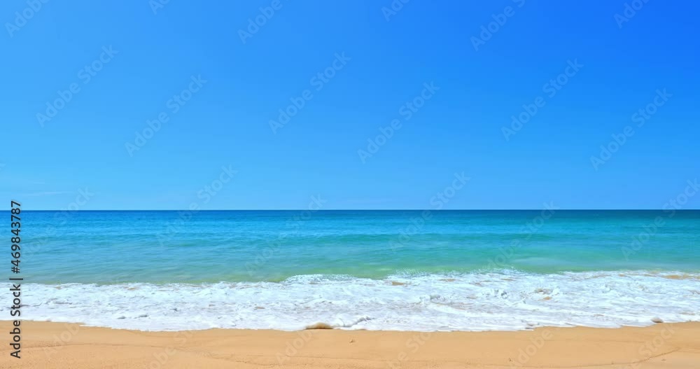 Sand beach slow motion waves and blue sky. No people landscape Sand beach slow motion waves and blue sky. No people landscape