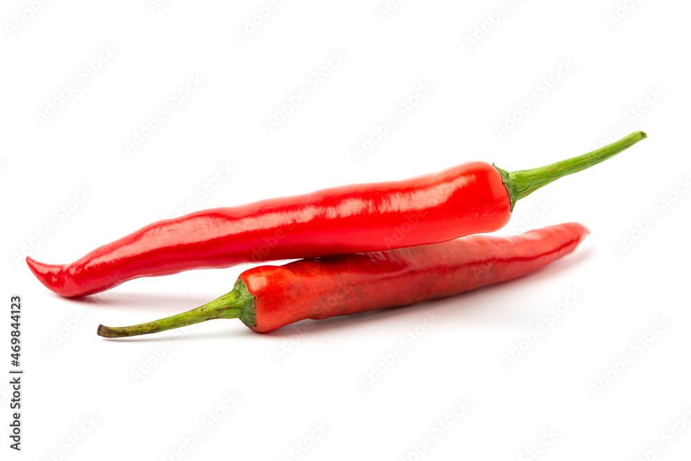 Fresh red peppers isolated on a white background.