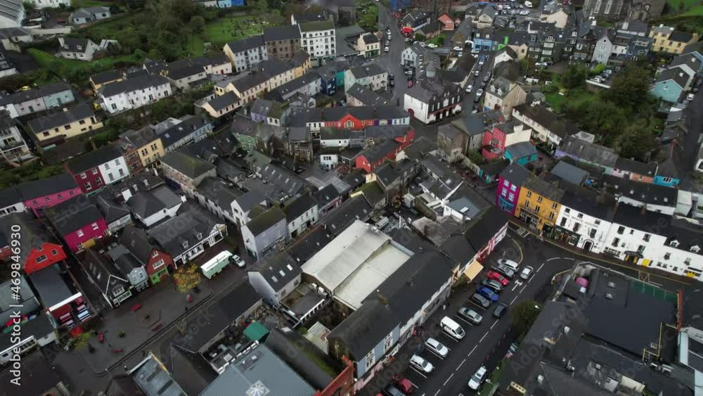 Downtown Kinsale, Ireland. Birds Eye Aerial View of Colorful Row Houses, Street Traffic and Cars on Humid Autumn Day, Drone Shot Downtown Kinsale, Ireland. Birds Eye Aerial View of Colorful Row Houses, Street Traffic and Cars on Humid Autumn Day, Drone Shot
