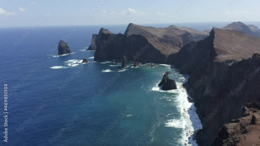 Waves Crashing In Cliffside Of Ponto do Rosto Madeira Island Portugal - aerial shot