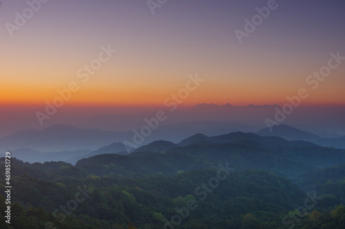 Aerial View of Doi chiang dao mountains in the morning and the sea of mist, Doi Kham Fa. Chiang Mai Province, Thailand. Pink cherry blossom. © 24Novembers
