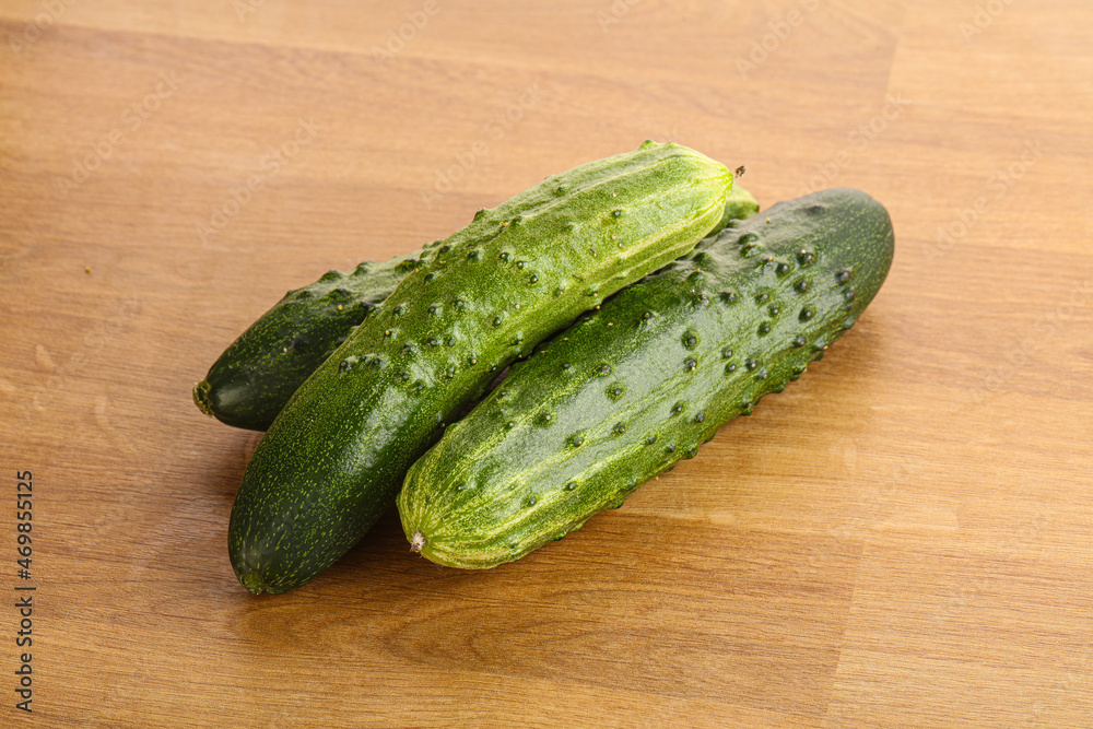 Fersh juicy green cucumbers heap Fersh juicy green cucumbers heap