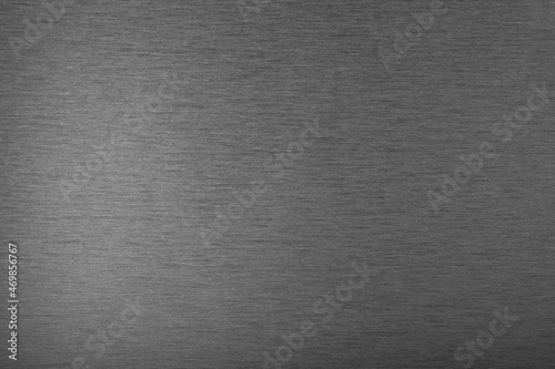Brushed black silver Stainless steel hair line plate aluminium metal background texture horizontal. Platinum silver wallpaper concept. © Bordinthorn
