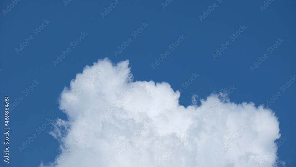 View of beautiful blue sky background with white clouds at the noon, Bangkok, Thailand. View of beautiful blue sky background with white clouds at the noon, Bangkok, Thailand.
