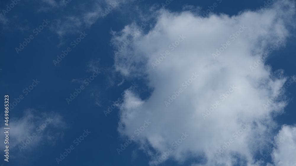 View of beautiful blue sky background with white clouds at the noon, Bangkok, Thailand. View of beautiful blue sky background with white clouds at the noon, Bangkok, Thailand.