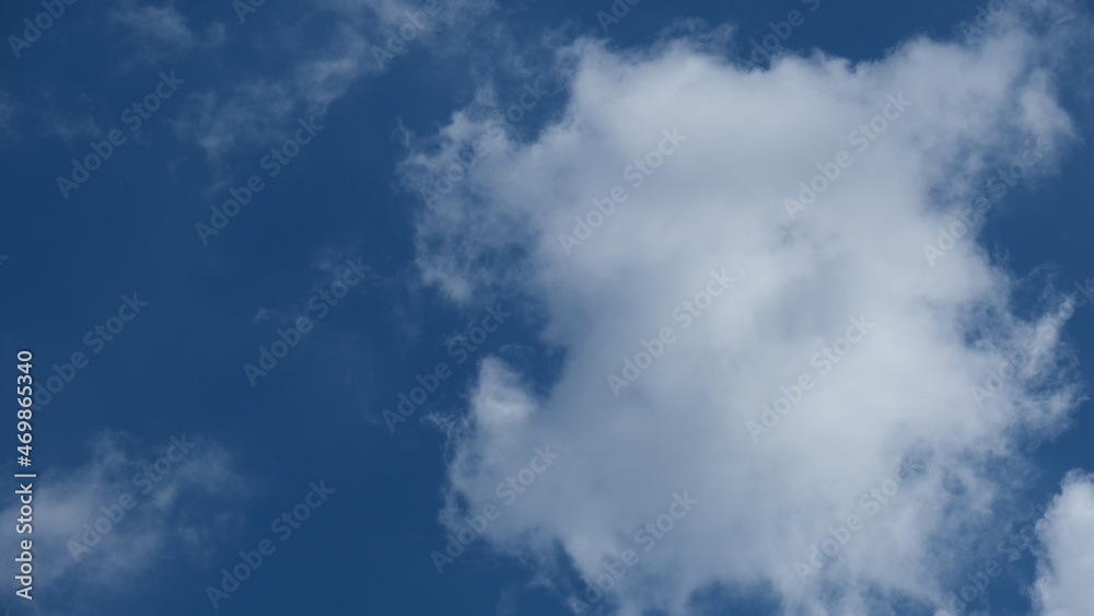 View of beautiful blue sky background with white clouds at the noon, Bangkok, Thailand. View of beautiful blue sky background with white clouds at the noon, Bangkok, Thailand.