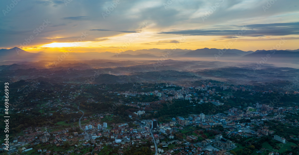 View from above, stunning aerial view of the city of Frosinone illuminated by a beautiful sunrise.  Frosinone is a town and comune in Lazio, Italy.